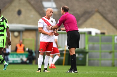 141017 Forest Green Rovers v Newport County - EFL SkyBet League 2 - David Pipe of Newport County is lectured by referee Carl Boyeson 