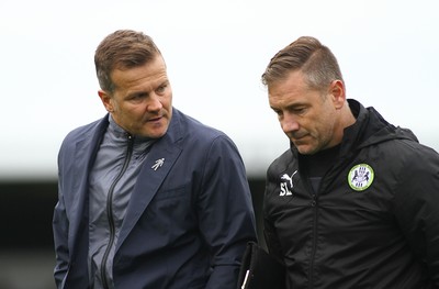 141017 Forest Green Rovers v Newport County - EFL SkyBet League 2 - Manager of Forest Green Rovers Mark Cooper leaves the field dejected with assistant Scott Lindsay 