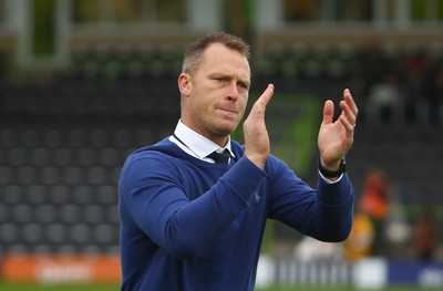 141017 Forest Green Rovers v Newport County - EFL SkyBet League 2 - Manager of Newport County Mike Flynn salutes the travelling support at the end of the game