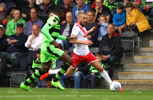 141017 Forest Green Rovers v Newport County - EFL SkyBet League 2 - Dan Butler of Newport County takes on Dale Bennett of Forest Green Rovers  