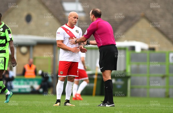 141017 Forest Green Rovers v Newport County - EFL SkyBet League 2 - David Pipe of Newport County is lectured by referee Carl Boyeson 