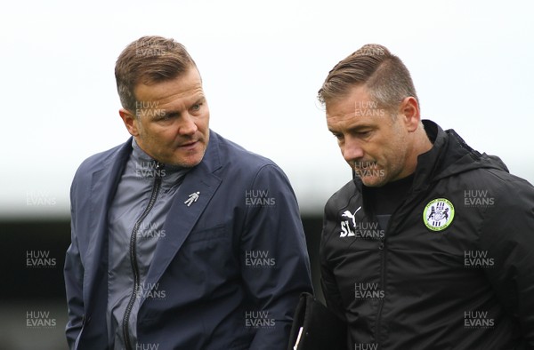 141017 Forest Green Rovers v Newport County - EFL SkyBet League 2 - Manager of Forest Green Rovers Mark Cooper leaves the field dejected with assistant Scott Lindsay 