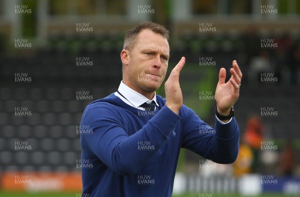 141017 Forest Green Rovers v Newport County - EFL SkyBet League 2 - Manager of Newport County Mike Flynn salutes the travelling support at the end of the game