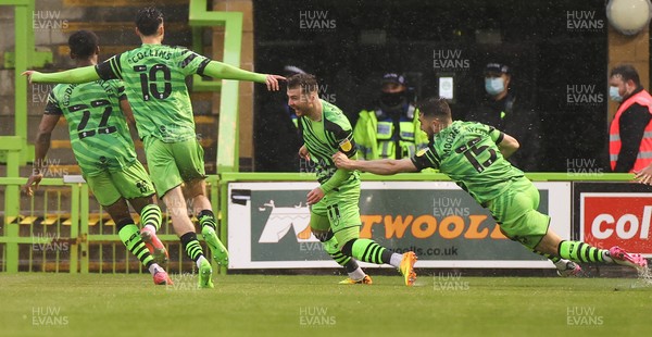 230521 - Forest Green Rovers v Newport County - SkyBet League Two Play off Semi-Final, Second Leg - Nicholas Cadden of Forest Green Rovers is mobbed by team mates as he celebrates scoring the third goal