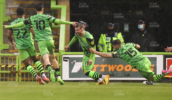 230521 - Forest Green Rovers v Newport County - SkyBet League Two Play off Semi-Final, Second Leg - Nicholas Cadden of Forest Green Rovers is mobbed by team mates as he celebrates scoring the third goal