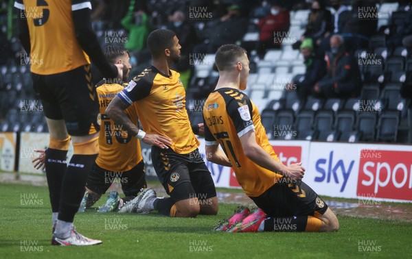 230521 - Forest Green Rovers v Newport County - SkyBet League Two Play off Semi-Final, Second Leg - Joss Labadie of Newport County, centre, celebrates with team mates after scoring the second goal