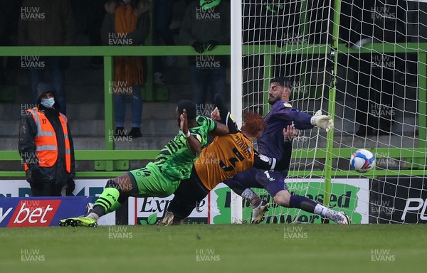 230521 - Forest Green Rovers v Newport County - SkyBet League Two Play off Semi-Final, Second Leg - Jamille Matt of Forest Green Rovers beats Ryan Haynes of Newport County and Newport County goalkeeper Tom King to score the fourth goal