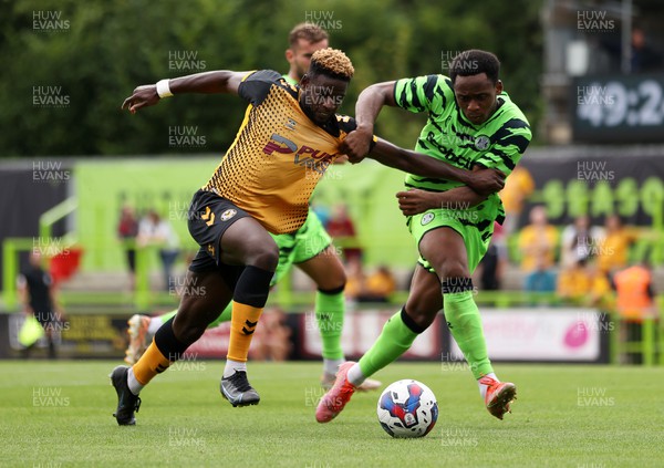 230722 - Forest Green Rovers v Newport County - Pre Season Friendly - Offrande Zanzala of Newport County is tackled by Udoka Godwin-Malife of Forest Green Rovers