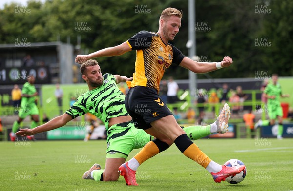 230722 - Forest Green Rovers v Newport County - Pre Season Friendly - Cameron Norman of Newport County is tackled by Baily Cargill of Forest Green Rovers