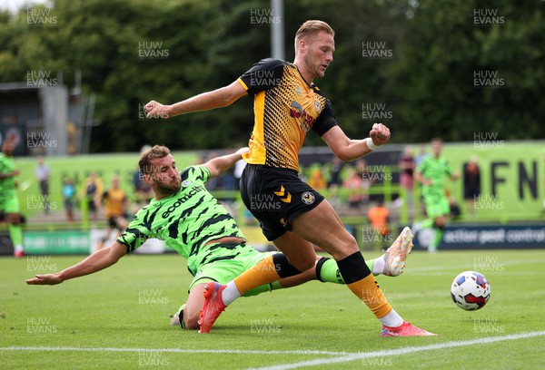 230722 - Forest Green Rovers v Newport County - Pre Season Friendly - Cameron Norman of Newport County is tackled by Baily Cargill of Forest Green Rovers
