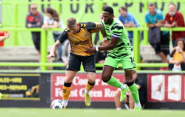 230722 - Forest Green Rovers v Newport County - Pre Season Friendly - Scot Bennett of Newport County is challenged by Jamille Matt of Forest Green Rovers