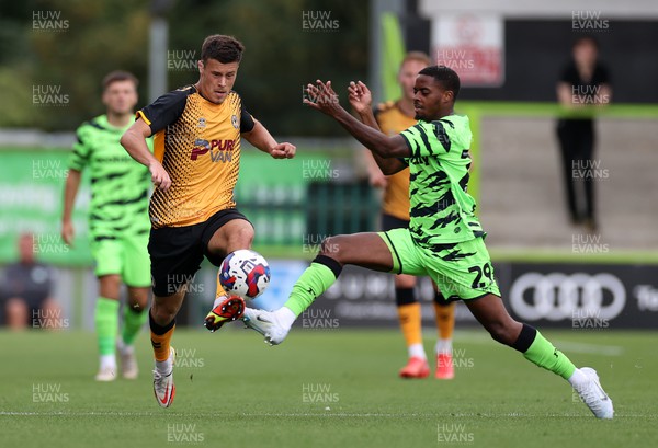 230722 - Forest Green Rovers v Newport County - Pre Season Friendly - Adam Lewis of Newport County is challenged by Reece Brown of Forest Green Rovers