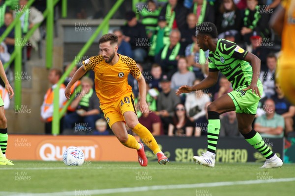 310819 - Forest Green Rovers v Newport County - EFL SkyBet League 2 - Josh Sheehan of Newport County takes on Ebou Adams of Forest Green Rovers
