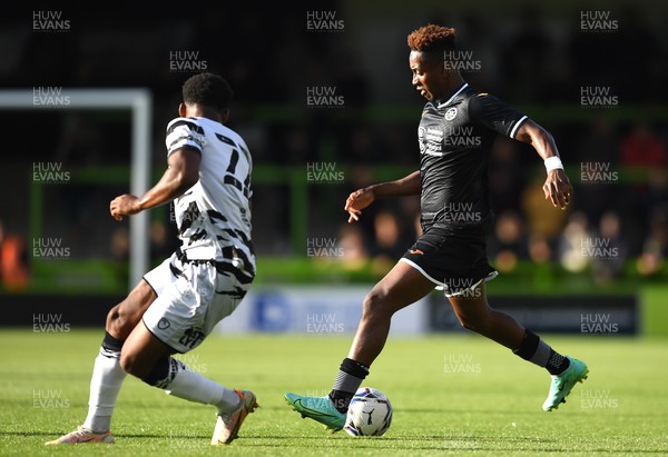 280721 - Forest Green Rovers v Swansea City - Preseason Friendly - Ollie Cooper of Swansea City is tackled by Udoka Godwin-Malife