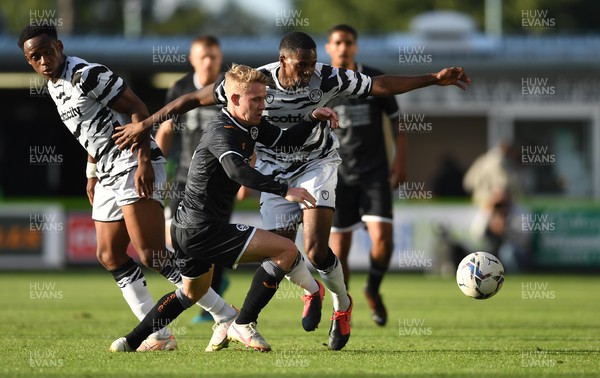 280721 - Forest Green Rovers v Swansea City - Preseason Friendly - Ollie Cooper of Swansea City and Sadou Diallo compete