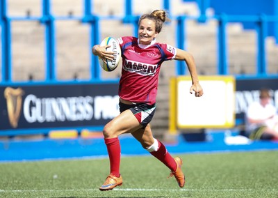 280816 - National Foster's 7s - Jasmine Joyce of Scarlets races away to score try during the Scarlets match against Ospreys in the Women's Championship