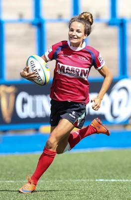 280816 - National Foster's 7s - Jasmine Joyce of Scarlets races away to score try during the Scarlets match against Ospreys in the Women's Championship