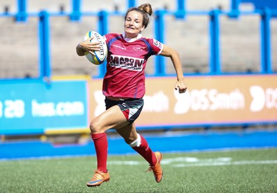 280816 - National Foster's 7s - Jasmine Joyce of Scarlets races away to score try during the Scarlets match against Ospreys in the Women's Championship