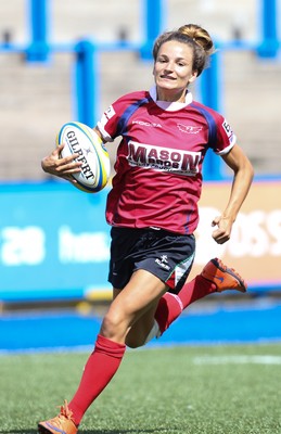 280816 - National Foster's 7s - Jasmine Joyce of Scarlets races away to score try during the Scarlets match against Ospreys in the Women's Championship