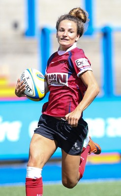 280816 - National Foster's 7s - Jasmine Joyce of Scarlets races away to score try during the Scarlets match against Ospreys in the Women's Championship