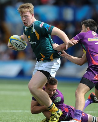 280816 - National Foster's 7s - Merthyr's Ben Sier is held during the match against Ebbw Vale