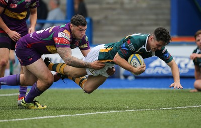 280816 - National Foster's 7s - Merthyr's Owen Jones powers over to score try during the match against Ebbw Vale