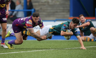 280816 - National Foster's 7s - Merthyr's Owen Jones powers over to score try during the match against Ebbw Vale