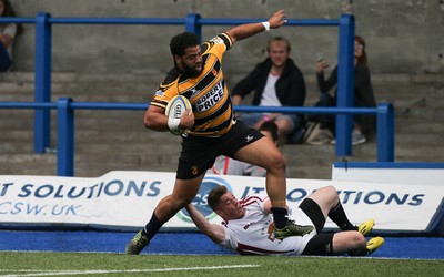 280816 - National Foster's 7s - Newport's Wes Cunliffe scores the winning try against Swansea