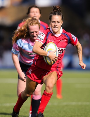 280816 - National Foster's 7s - Ffion Lewis of Scarlets races in to score a try in the semi final match against Blues