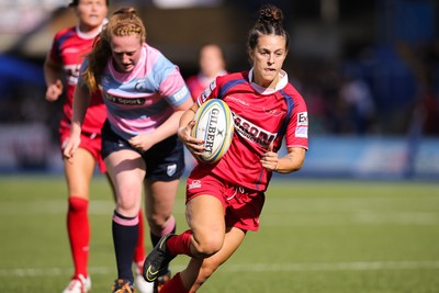 280816 - National Foster's 7s - Ffion Lewis of Scarlets races in to score a try in the semi final match against Blues