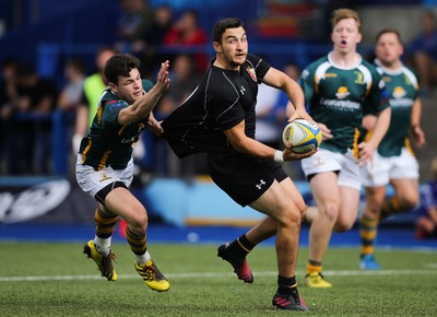 280816 - National Foster's 7s - Will Bryan of RGC 1404 looks for support as he is tackled by Adam Hoskins of Merthyr in the semi final of the Plate Competition