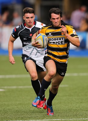 280816 - National Foster's 7s - Newport's Elliot Frewen races in to score try  against Pontypridd in the semi final of the Plate Competition