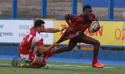 280816 - National Foster's 7s, Cup Final - Aberavon's Mike Wilson is tackled by Aron Evans of Llandovery