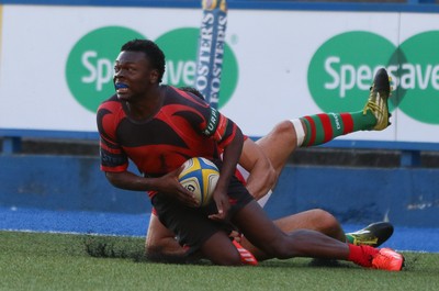 280816 - National Foster's 7s, Cup Final - Aberavon's Mike Wilson is tackled by Aron Evans of Llandovery