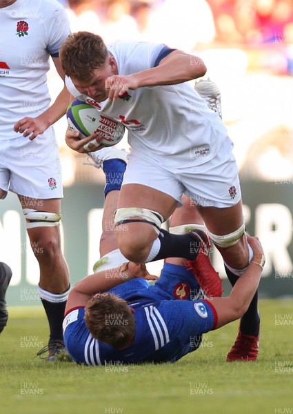 170618 - France U20 v England U20, World Rugby U20 Championship Final - Ted Hill of England charges through the tackle of Antonin Berruyer of France