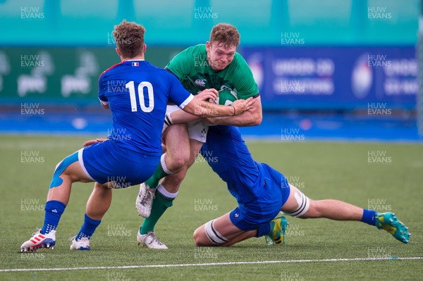 130721 - France U20 v Ireland U20 - Under 20 Six Nations  - Cathal Forde of Ireland  is tackled by Thibault Debaes of France and Matthias Haddad Victor of France