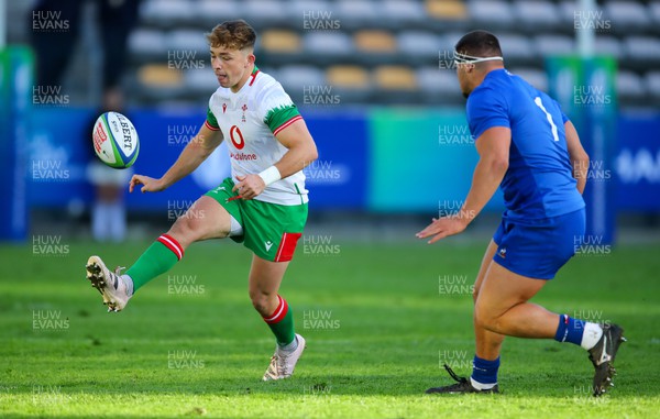 040723 - France v Wales - World Rugby U20 Championship - Daniel Edwards of Wales chips the ball ahead