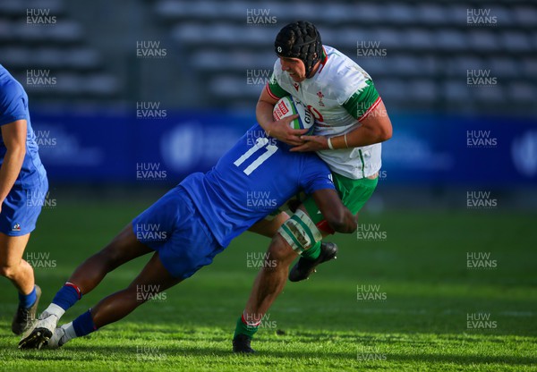 040723 - France v Wales - World Rugby U20 Championship - Jonny Green of Wales is tackled by Mael Moustin of France