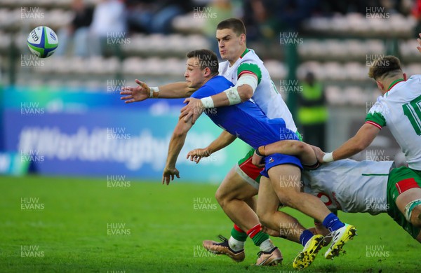 040723 - France v Wales - World Rugby U20 Championship - Bryn Bradley of Wales tries to stop a French player from getting the ball to his backline