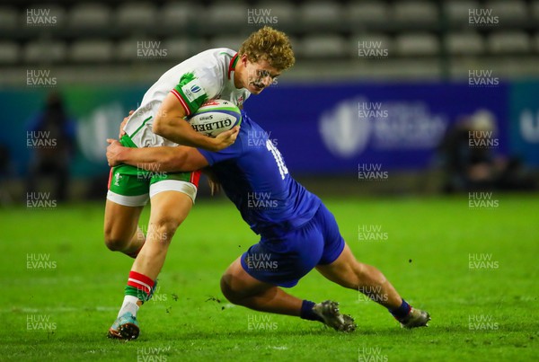 040723 - France v Wales - World Rugby U20 Championship - Joe Westwood of Wales is tackled by Thomas Lacombre of France