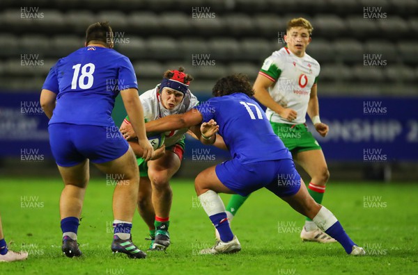 040723 - France v Wales - World Rugby U20 Championship - Josh Morse of Wales is tackled by Alexandre Kaddouri of France