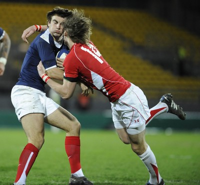 19.03.11 - France U20 v Wales U20 - Under 20 Six Nations - Jean-Pascal Baraque of France is tackled by LIam William of Wales. 