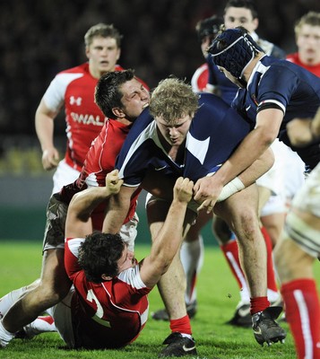 19.03.11 - France U20 v Wales U20 - Under 20 Six Nations - Kirby Myhill of Wales tackles Gillian Galan of France. 