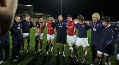 19.03.11 - France U20 v Wales U20 - Under 20 Six Nations - Wales assistant coach Richard Webster talks to his players at the end of the game. 