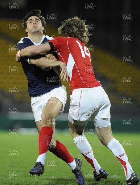 19.03.11 - France U20 v Wales U20 - Under 20 Six Nations - Jean-Pascal Baraque of France is tackled by LIam William of Wales. 