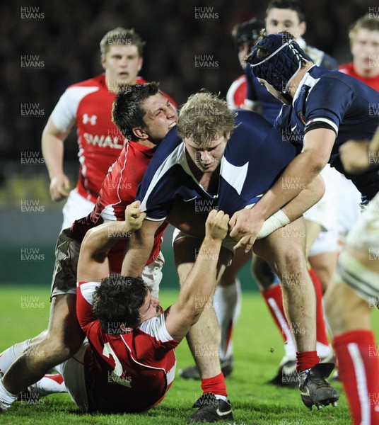 19.03.11 - France U20 v Wales U20 - Under 20 Six Nations - Kirby Myhill of Wales tackles Gillian Galan of France. 