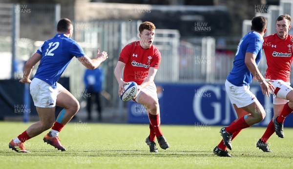 030219 - France U20s v Wales U20s - U20s 6 Nations Championship - Aneurin Owen of Wales is challenged by Julien Delbouis of France