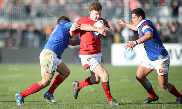 030219 - France U20s v Wales U20s - U20s 6 Nations Championship - Aneurin Owen of Wales is tackled by Louis Carbonel of France