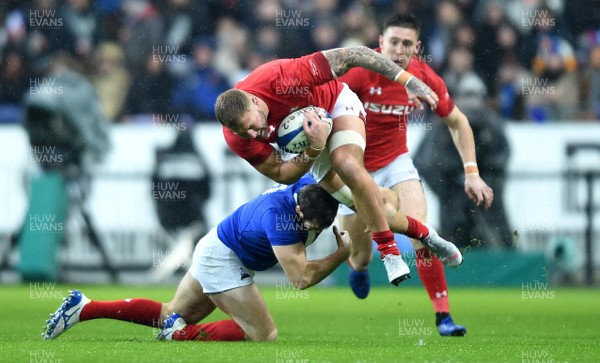 010219 - France v Wales - Guinness 6 Nations 2019 - Ross Moriarty of Wales is tackled by Camille Lopez of France