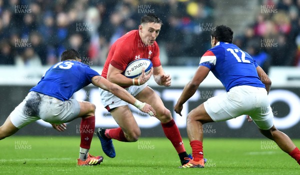 010219 - France v Wales - Guinness 6 Nations 2019 - Josh Adams of Wales is tackled by Romain Ntamack and Wesley Fofana of France